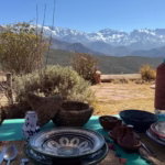 Traditional Berber lunch at private house in Sidi Fares — panoramic three valley views High Atlas Morocco Marrakech tour