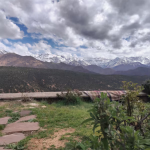 Atlas Mountains 3 valleys and waterfalls day trip from Marrakech — panoramic High Atlas landscape with Berber villages Morocco