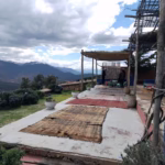 Traditional Berber lunch at private house in Sidi Fares — panoramic three valley views High Atlas Morocco Marrakech tour