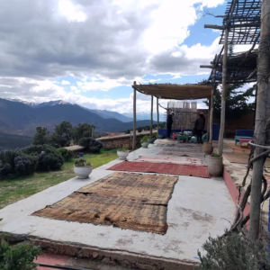 Traditional Berber lunch at private house in Sidi Fares — panoramic three valley views High Atlas Morocco Marrakech tour