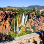 Panoramic view of Ouzoud Waterfalls from above — olive groves and Middle Atlas gorge on a private Marrakech day excursion