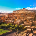 Ait Benhaddou UNESCO kasbah day trip from Marrakech — ancient fortified ksar rising from pre-Saharan desert Morocco