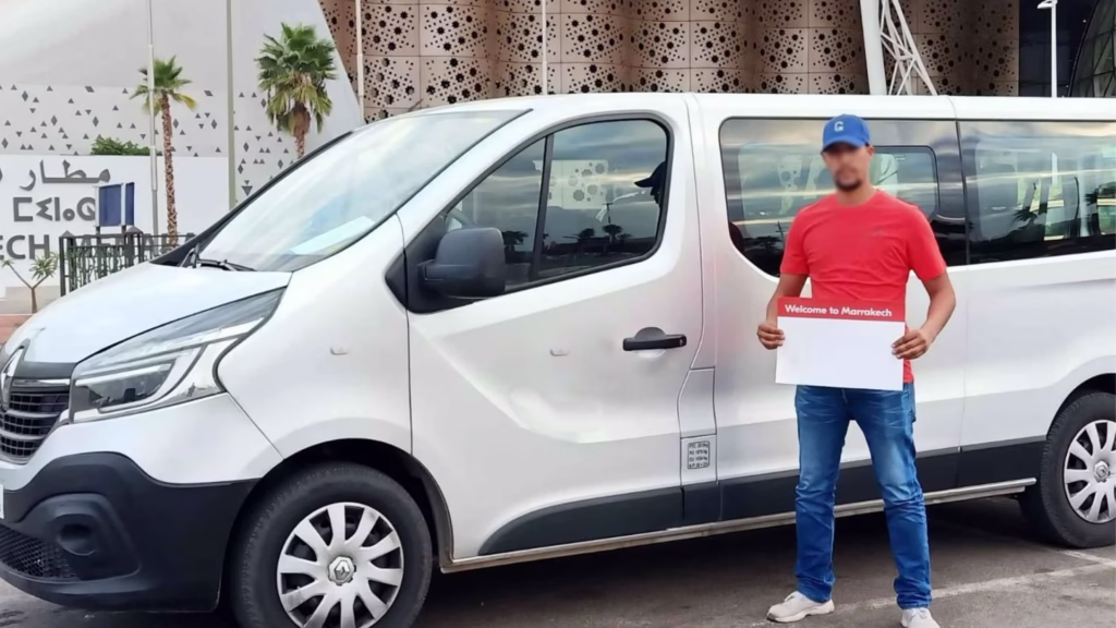 Clean air-conditioned private transfer vehicle waiting outside Marrakech airport with professional driver