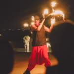 Fire show performance during luxury dinner in Agafay Desert near Marrakech Morocco