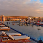 Agafay luxury swimming pool with panoramic desert and Atlas Mountains views — pool and lunch pass from Marrakech Morocco