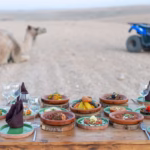Three-course Moroccan lunch included in Agafay pool pass — fresh salads, traditional tagine and dessert near Marrakech
